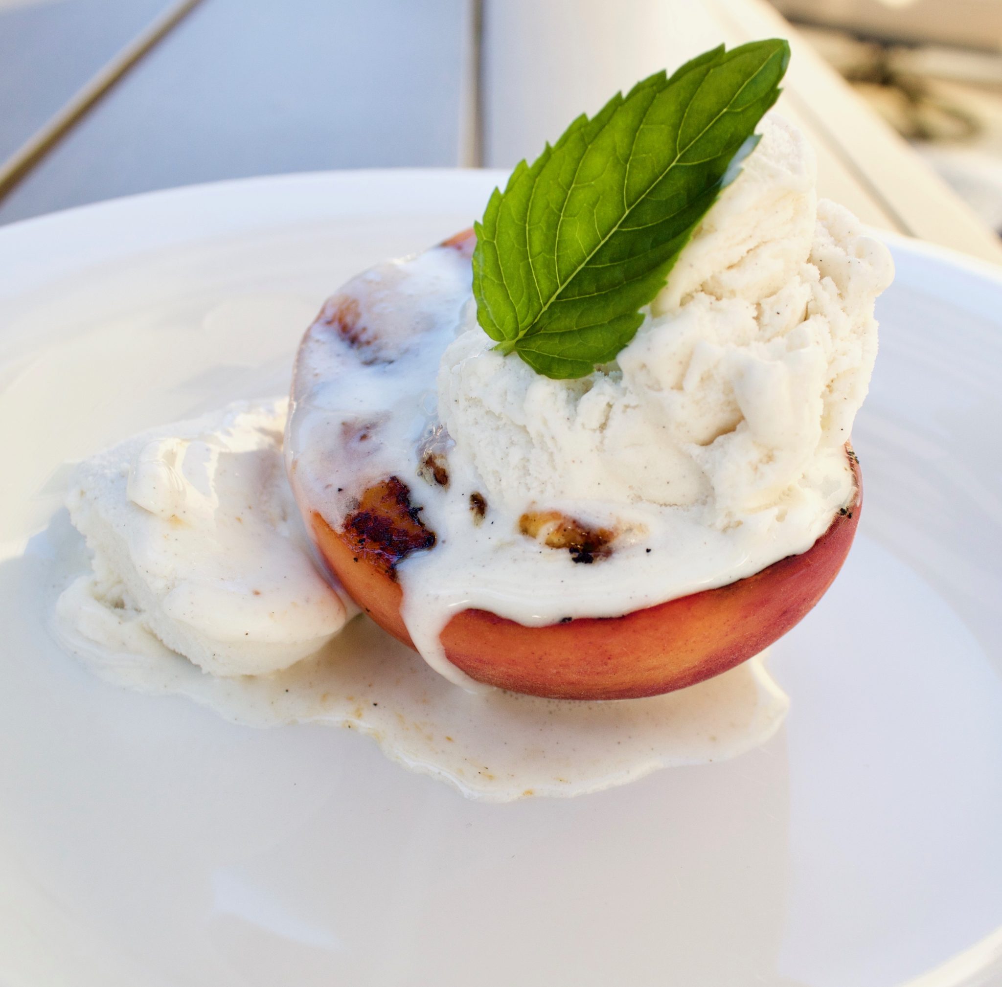 Grilled Peaches With Vanilla Ice Cream - What's Gaby Cooking